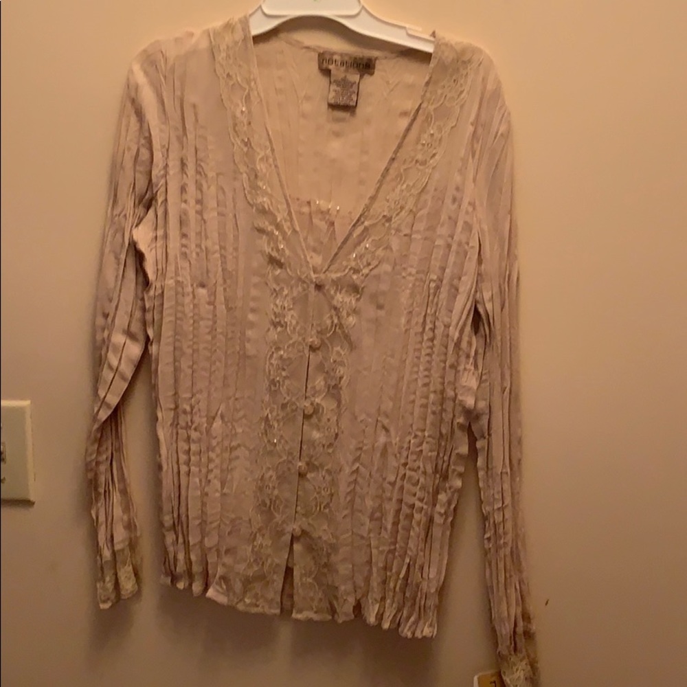 Button down blouse  beige color.